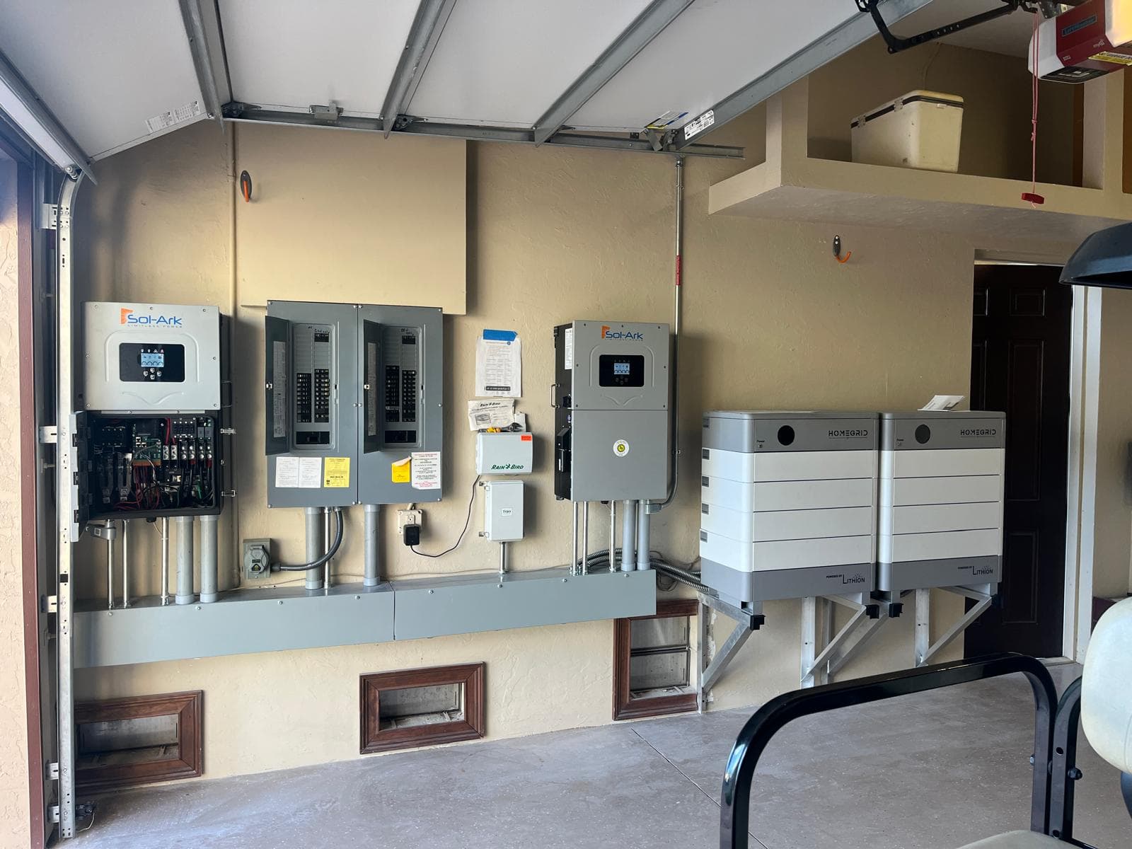 Sol-Ark hybrid inverters and battery storage system installed in garage by S7 Solar