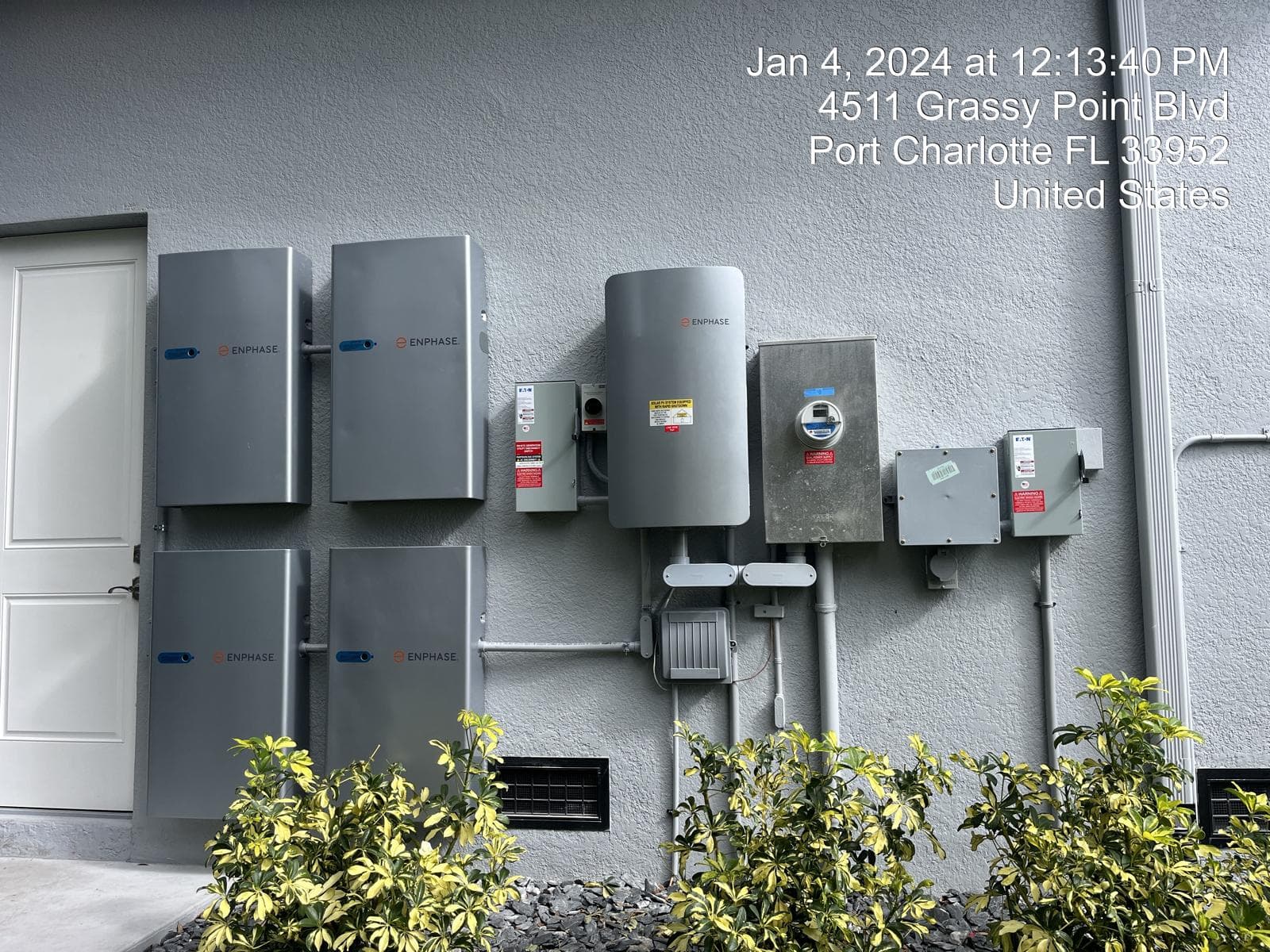 Enphase battery storage system installed on exterior wall by S7 Solar in Port Charlotte, FL