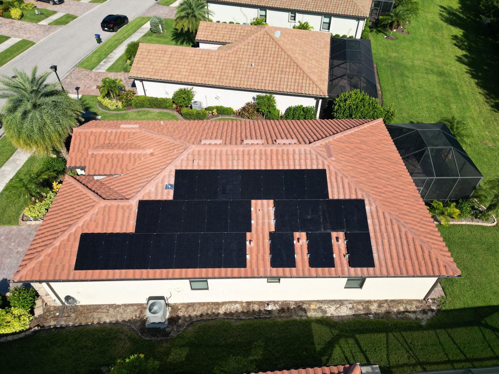 Large-scale solar panel array on tile roof home in Southwest FL