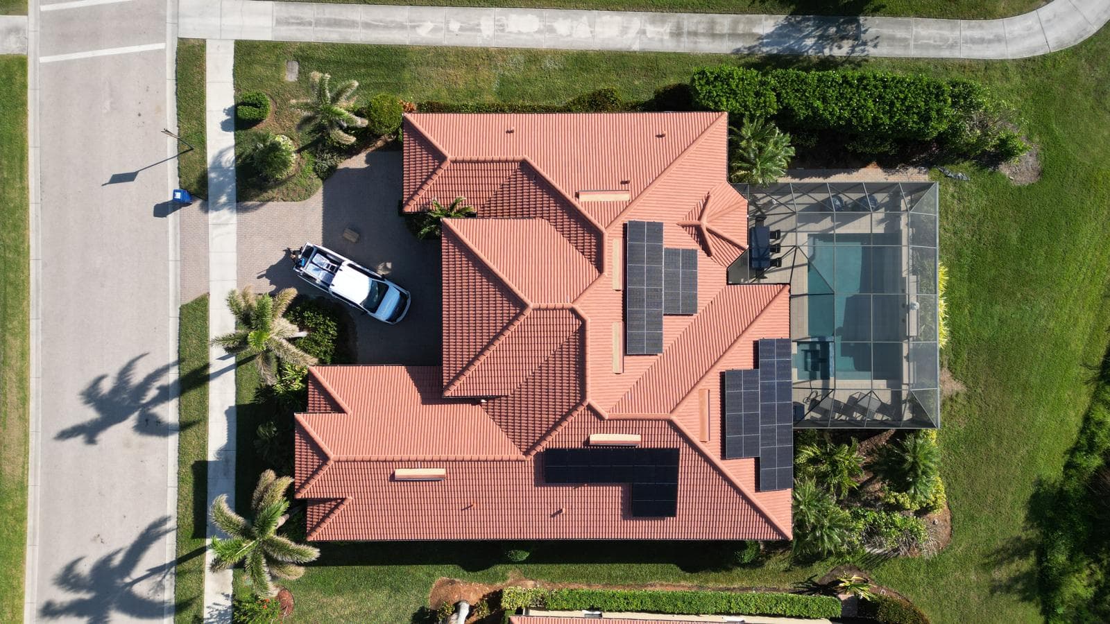 Drone aerial of completed solar system on tile roof in Southwest FL