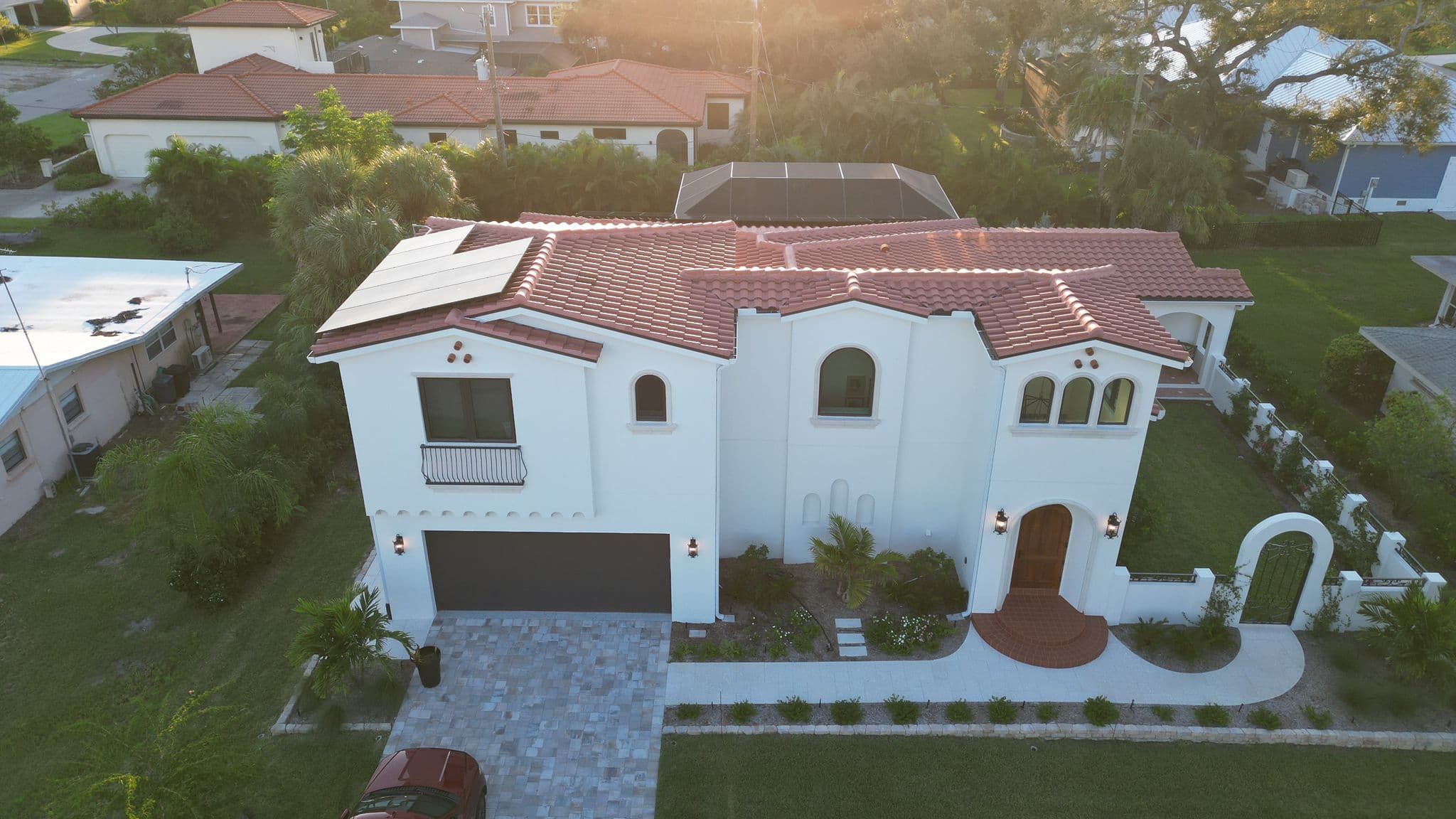 Front view of beautiful Spanish-style home with solar panels installed by S7 Solar in Venice, FL